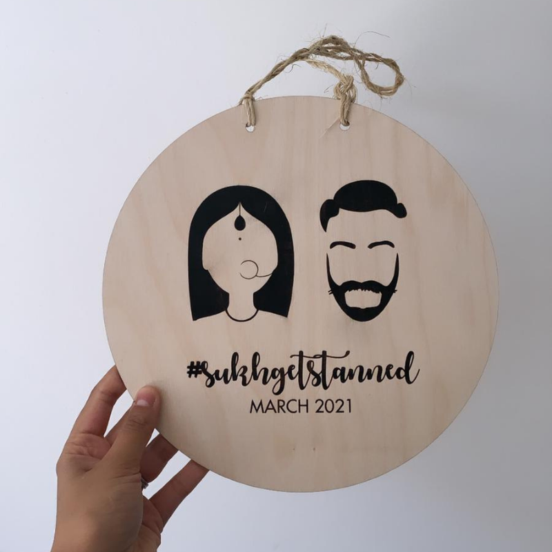 Personalised circular plaque with lady logo and non-turban man 