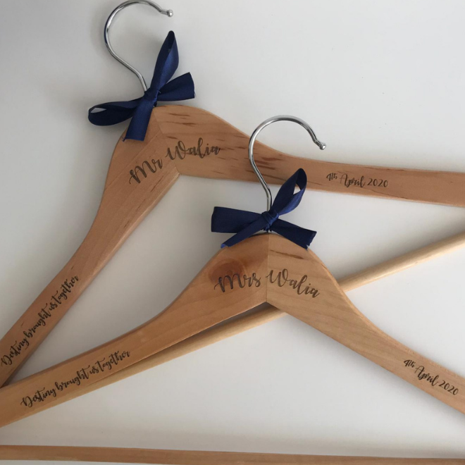 Personalised wooden hangers with pink bow