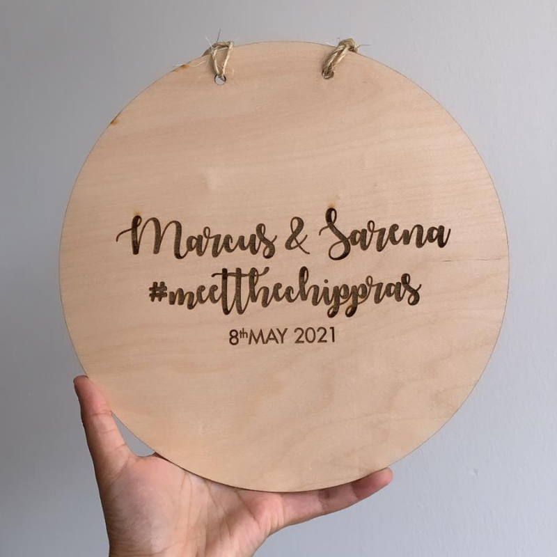 Personalised circular plaque with engraved writing