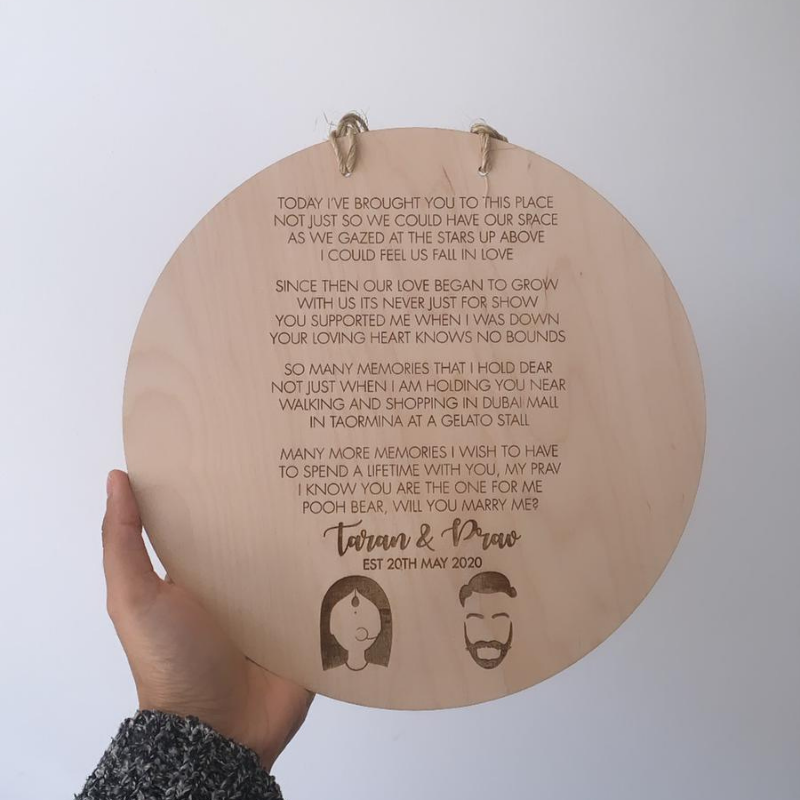 Personalised circular plaque with engraved writing and logos