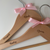 Personalised wooden hangers with pink bow